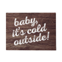 baby, it's cold outside! on dark wood background