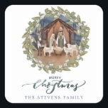 Baby Jesus in the Manger Nativity  Square Sticker<br><div class="desc">These traditional Christmas stickers feature a nativity image of baby Jesus sleeping in a manger with Mary and Joseph in the centre surrounded by a berry wreath. Below are the words "Merry Christmas."  You can personalise with your name.</div>