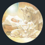 Baby Jesus Nativity with Lambs and Donkey Classic Round Sticker<br><div class="desc">I really wanted to do a Nativity painting with only baby animals around the Baby Jesus,  and this was the result.  A soft golden light surrounds the scene where Jesus lays in the manger,  two baby lambs have bedded down in front and a baby donkey watches over them all.</div>