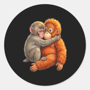 Baby macaque hugging plush cute monkey monkey classic round sticker