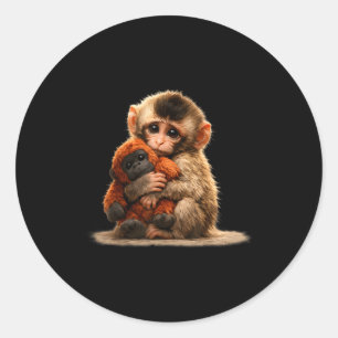 Baby monkey hugging plush cute japanese macaque classic round sticker