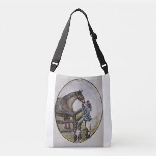 baby race horse mare in stall , on one side and in crossbody bag