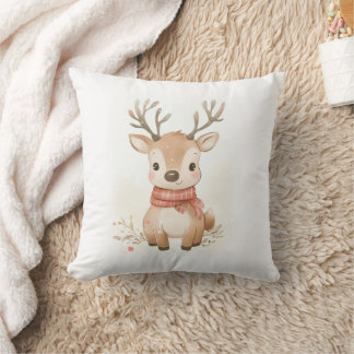 Baby reindeer sitting in the snow cushion