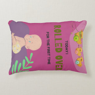 Baby rolling over decorative cushion