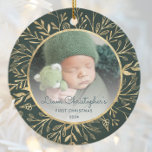 Babys 1st Christmas Photo Gold Foliage Green Round Ceramic Ornament<br><div class="desc">Celebrate baby's first Christmas with this beautiful keepsake ornament. Easily replace the sample image with your own favourite photo and customise it with baby's name in dark green script font and the year below. A white gradient screen helps make the text pop. The photo is set off by an elegant...</div>
