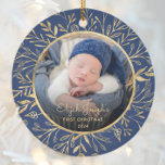 Baby's 1st Christmas Photo Gold Foliage Navy Blue Ceramic Ornament<br><div class="desc">Celebrate baby's first Christmas with this beautiful keepsake ornament. Easily replace the sample image with your own favourite photo and customise it with baby's name in gold-coloured script font and the year below. A black gradient screen helps make the text pop. The photo is set off by an elegant round...</div>