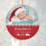 Baby's First Christmas 2023 Red White Custom Photo Ceramic Ornament<br><div class="desc">Celebrate your baby's first Christmas with this adorable ornament,  featuring a row of white snowflakes and white text on a red background. Personalise it with baby's photo,  name in white sketched font,  and the year framed by a rustic white banner. Also available in other colour combinations.</div>