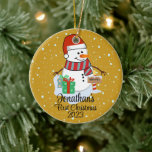 Baby's First Christmas cute snowman modern colour Ceramic Ornament<br><div class="desc">A whimsical Christmas tree ornament featuring an adorable snowman surrounded by delicate snowflakes. Customise it with your child's name and the year for a personalised touch that captures the joy of the season.
Use the "Personalise" button to customise to your liking</div>
