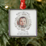 Baby's First Christmas Photo  Metal Ornament<br><div class="desc">Baby's first Christmas heirloom ornament baby photo for mom and dad. Add your baby's photo surrounded by Christmas boughs and a cute handwritten style typeface font. This ornament is designed for new parents. Mom can surprise dad, or dad can surprise mom with this lovely holiday gift. Add a new heirloom...</div>