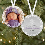 Baby's First Christmas | Snowflake Photo Ornament<br><div class="desc">Snowflake framed baby's first Christmas photo ornament design features a round wreath of delicate white snowflakes that frame photo as an overlay design. A custom message appears on the back of the ornament along with a silver coloured background (can be modified). This holiday photo ornament design can be personalised with...</div>