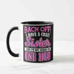 Back Off I Have A Crazy Sister And I'M Not Afraid Mug<br><div class="desc">Back Off I Have A Crazy Sister And I'M Not Afraid To Use He Gift. Perfect gift for your dad,  mom,  papa,  men,  women,  friend and family members on Thanksgiving Day,  Christmas Day,  Mothers Day,  Fathers Day,  4th of July,  1776 Independent day,  Veterans Day,  Halloween Day,  Patrick's Day</div>