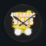 Back To School 4th Grade Vibes Shirt First Day Kid Round Clock<br><div class="desc">Back To School 4th Grade Vibes Shirt First Day Teacher Kids
4th, grade, shirt, gift, ideas, back to school, 2021, first day of school, gift idea, 4th grade, student, teacher, fourth grade, school fourth grade, 4th grade teacher, student, teaching, 4th grade squad, kids, gifts</div>