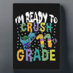 Back To School I'm Ready To Rock 11th Grade Dino Plaque<br><div class="desc">Back To School I'm Ready To Crush 11th Grade Dino
11th, grade, gift, ideas, back to school, 2021, first day of school, gift idea, 11th, grader, student, eleventh, grade, dinosaur, school, teacher, grade, 11th grade teacher, student, teaching, 11th grade squad, kids, gifts</div>