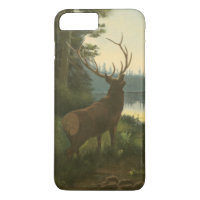 Back view of Elk Looking over a Lake