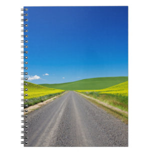Backcountry road through Spring Canola Fields Notebook