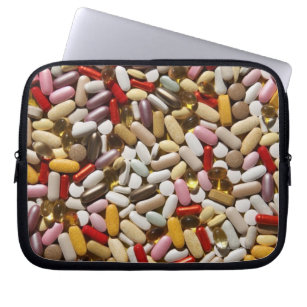 Background of colourful multi-vitamin pills, laptop sleeve