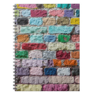 Background of painted colour brick wall texture notebook