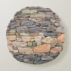 background of stone wall texture photoabandoned, a round cushion