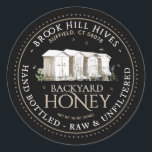 Backyard Hives Honey Label Hand Bottled Raw<br><div class="desc">Put your bees front and centre by choosing this beautiful rendition of a backyard hive on a black background. This label exudes all the characteristics of a picturesque family business, while still maintaining a strong level of sophistication with a professional touch. Simply personalise with your apiary name, address and honey...</div>