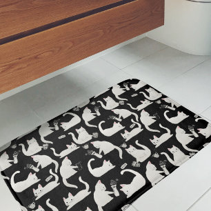 Bad Cats Knocking Stuff Over, White Cats on Black Bath Mat