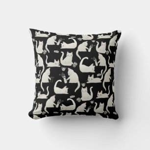 Bad Cats Knocking Stuff Over, White Cats on Black Cushion