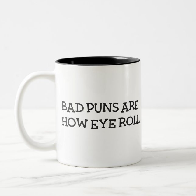 Bad puns black Two-Tone coffee mug (Left)