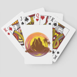 Badge with tropical volcano scenery and palm trees playing cards