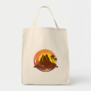 Badge with tropical volcano scenery and palm trees tote bag