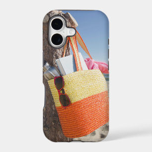 Bag Hanging On Tree Trunk At Sandy Beach