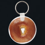 BAGEL 2  KEY RING<br><div class="desc">A bagel, also spelled beigel, is a bread product originating in the Jewish communities of Poland. It is traditionally shaped by hand into the form of a ring from yeasted wheat dough, roughly hand-sized, that is first boiled for a short time in water and then baked. The result is a...</div>