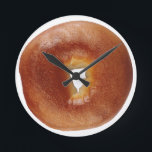 BAGEL 2    ROUND CLOCK<br><div class="desc">A bagel, also spelled beigel, is a bread product originating in the Jewish communities of Poland. It is traditionally shaped by hand into the form of a ring from yeasted wheat dough, roughly hand-sized, that is first boiled for a short time in water and then baked. The result is a...</div>