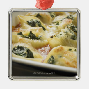 Baked pasta shells with spinach filling metal ornament