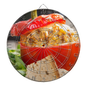 Baked stuffed peppers with meat sauce and cheese dartboard