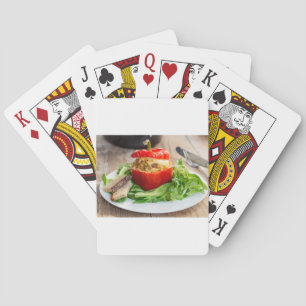 Baked stuffed peppers with meat sauce and cheese playing cards