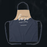 Baking is Love made Edible NAVY & TAN Script Apron<br><div class="desc">Baking is Love Made Edible. NAVY & TAN. Clean Modern Script design.Your Homemade Baking frame-worthy. Sign your masterpiece with a flourish with this understated classy ALL-OVER PRINT APRON.. This design Coordinates with our Artisan Dough Covers--which you can find here: https://www.zazzle.com/collections/challah_baking_is_love_script_series-119661066919466646 Baking enthusiasts: Express yourself & show off your personal style...</div>
