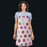 Baking Queen Pink Sprinkle Doughnuts Watercolor Na Apron<br><div class="desc">Tease your tastebuds with this delicious pattern. It depicts a cute, artsy, and modern hand-drawn and hand-painted watercolor doughnut pattern. The colour palette includes pinks, purples, browns, and white with the background being a blush pink. The doughnuts feature different flavours such as blueberry, strawberry, chocolate, coconut, raspberry, and vanilla. The...</div>