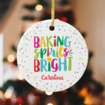 Baking Spirits Bright Colourful Sprinkles Christma Ceramic Ornament<br><div class="desc">This Christmas design features the text "baking spirits bright" in fun, colourful typography surrounded by a border of rainbow sprinkles! Click the customise button if you would like to move/scale the images and further modify the text! Variations of this design, additional colours, as well as coordinating products are available in...</div>