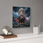 Bald Eagle Wearing an American Flag Cape Square Wall Clock<br><div class="desc">A bald eagle is perched on a tree branch during a thunderstorm,  wearing an American flag and a Native American feather headdress.</div>