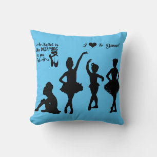 Ballerina throw pillow in blue and black.