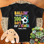 Ballin' Through 100 Days of School T-Shirt<br><div class="desc">The vibrant graphics and playful typography featured in the "Ballin' Through 100 Days of School" collection are more than just eye-catching; they are designed to inspire enthusiasm and pride in educational accomplishments.</div>