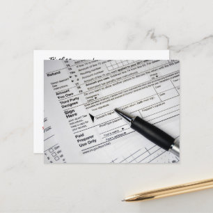 Ballpoint Ink pen On Tax Form Postcard
