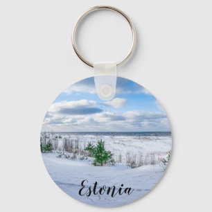 Baltic sea coast covered in snow in winter key ring