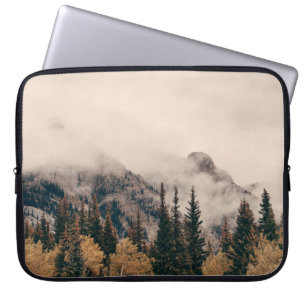 Banff national park foggy mountains and forest in laptop sleeve