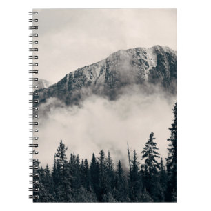 Banff national park foggy mountains and forest in notebook