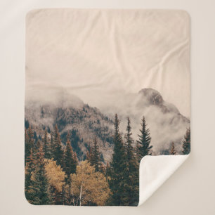 Banff national park foggy mountains and forest in  sherpa blanket