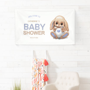 Banner for baby shower with cute plush bunny.