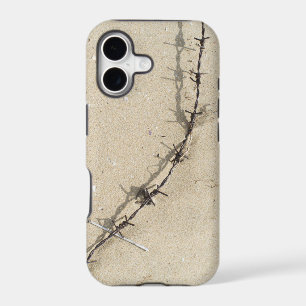 Barbed wire and sand