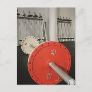 Barbell in gym postcard