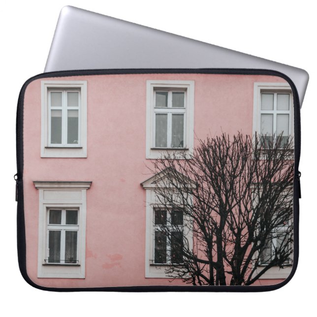 BARE TREE IN FRONT OF PINK BUILDING LAPTOP SLEEVE (Front)