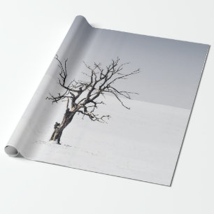 BARE TREE IN THE MIDDLE OF SNOW WRAPPING PAPER